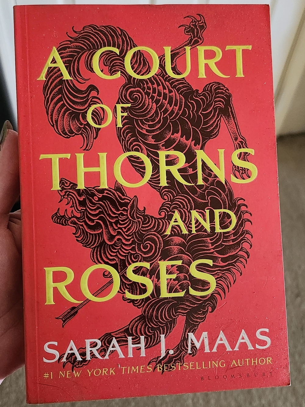 A Court of Thorns and Roses by Sarah J. Maas - Red Paperback